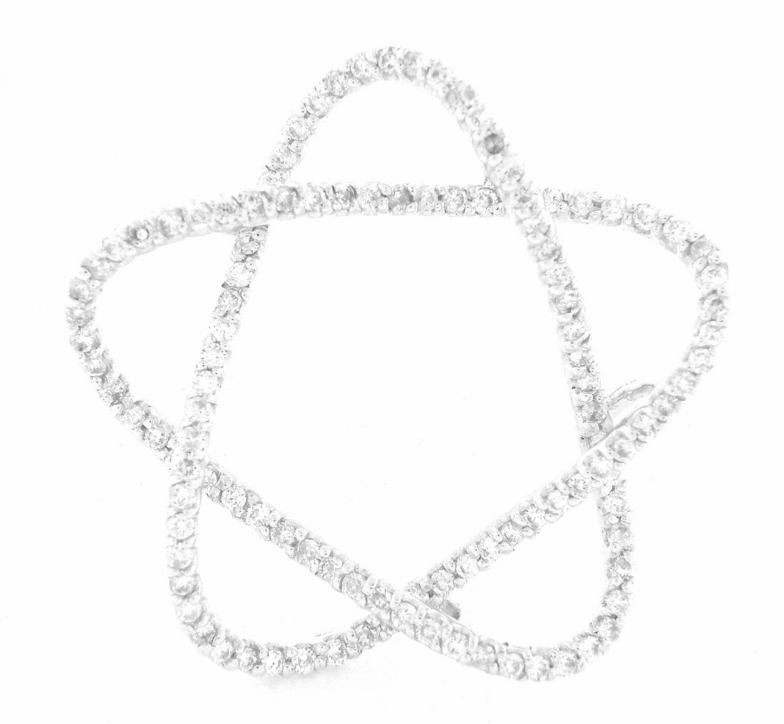 18K WHITE GOLD DIAMOND OPEN STAR PENDANT: Star PendantConditionNewMaterial18K White goldStonesDiamonds H SI1Stone Weight0.50tcw Size1.00" H x 1.00" WWeight3.5g