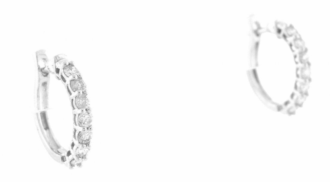 14K WHITE GOLD DIAMOND HUGGIE HOOPS EARRINGS 0.60ct: Diamond EarringsConditionNewMaterial14k White goldStonesDiamonds H SI1Stone Weight0.60ct twSize0.60" HighWeight2.5g