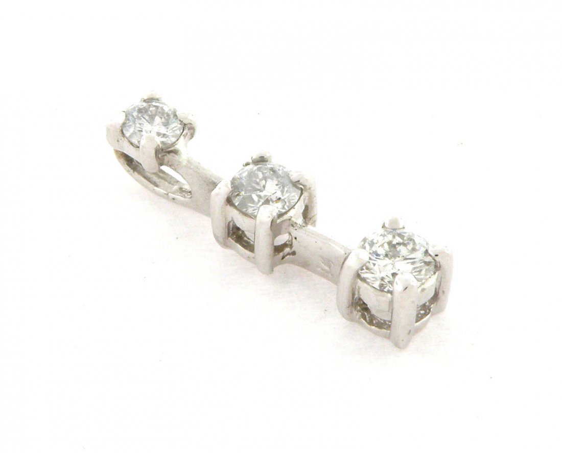 NEW 14K WHITE GOLD DIAMOND JOURNEY PENDANT 0.60CT: Journey PendantConditionNewMaterial14K White goldStonesDiamonds H SI1Stone Weight0.60 tcwSize0.76" H x 0.18" WWeight1.3g