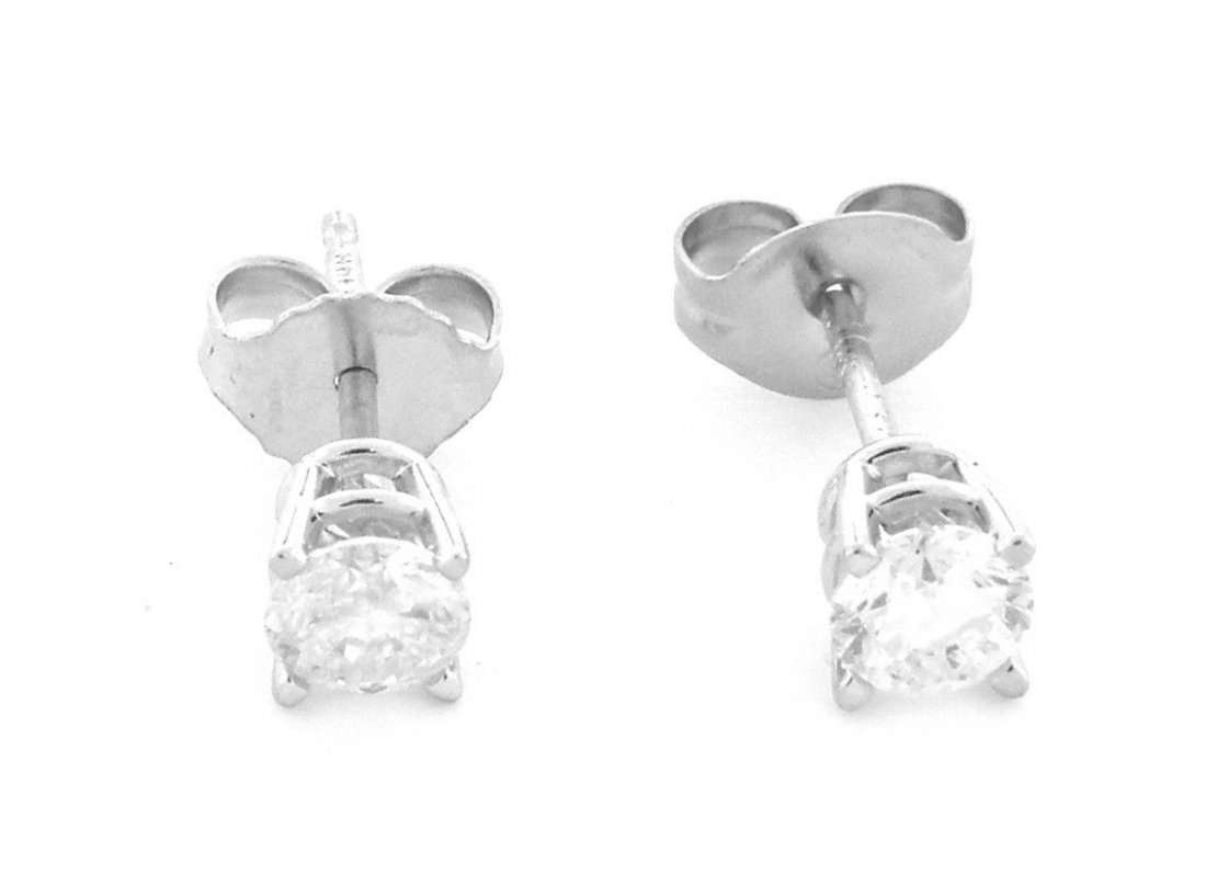 14K WHITE GOLD NATURAL DIAMOND STUDS EARRINGS 0.40ct: Ladies EarringsConditionNewMaterial14k white goldStonesNatural Diamonds H SI2Stone Weight0.40ct tw (0.20ct x 2)Size3.8mm stonesWeight0.7g