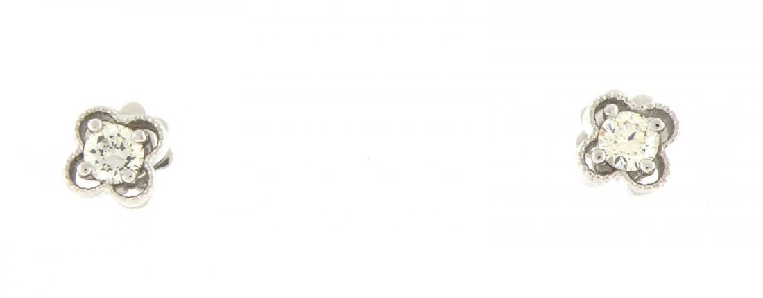 NEW 14K WHITE GOLD NATURAL DIAMOND STUDS EARRINGS: ItemLadies EarringsConditionNewMaterial14k White goldStonesNatural Diamonds J SI1Stone Weight0.67ct tw Weight2.4g