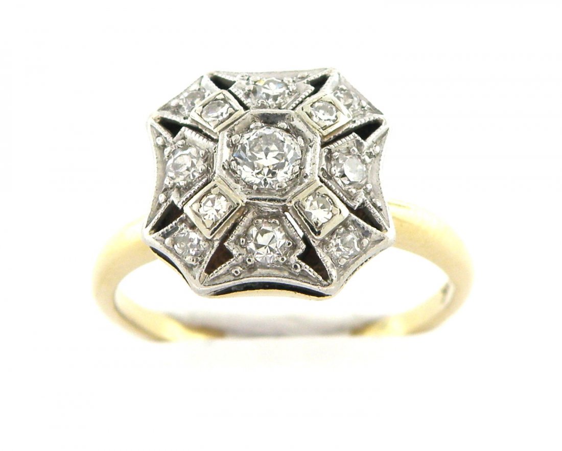 VINTAGE ESTATE 14K TWOTONE GOLD DIAMOND COCKTAIL RING: Ladies Cocktail ringConditionVintage, pre-owned, In good conditionMaterial14K two tone goldStonesOld mine cut Diamonds G SI1Stone Weight0.50ct twSize8 (we can re-size, please contact us first)Weight4.