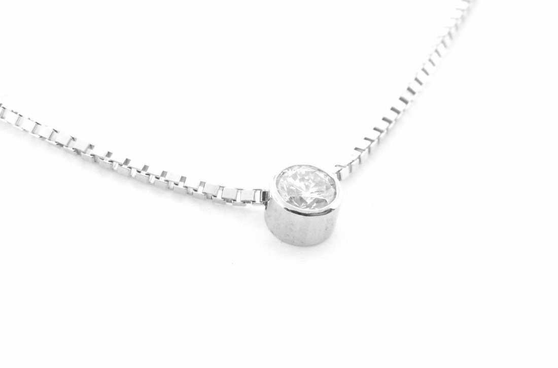 NEW 14K WHITE GOLD LADIES DIAMOND SOLITAIRE NECKLACE: Diamond Solitaire NecklaceConditionNewMaterial14k White goldStonesDiamond H SI1Stone Weight0.50ct twSize16"Weight3.2g