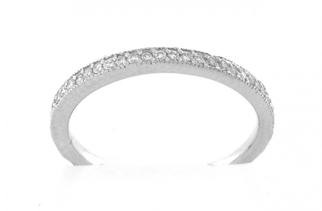 NEW 14K WHITE GOLD ETERNITY DIAMOND WEDDING BAND: Diamond Eternity RingConditionNewMaterial14K White goldStonesDiamonds H SI1Stone Weight0.30ct tw apxSize5.5 - 1.7mm WideWeight1.6gCommentAlmost full eternity (minus gap in back for sizing)