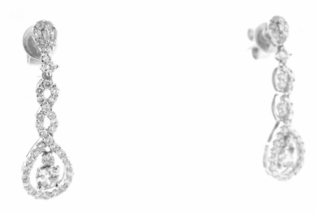 14K WHITE GOLD DIAMOND CHANDELIER DANGLE EARRINGS: Ladies Chandelier EarringsCondition NewMaterial 14k White goldStones Diamonds G SI1Stone Weight 1.10ct twSize 1.07" L x 0.31" WWeight 3.7g