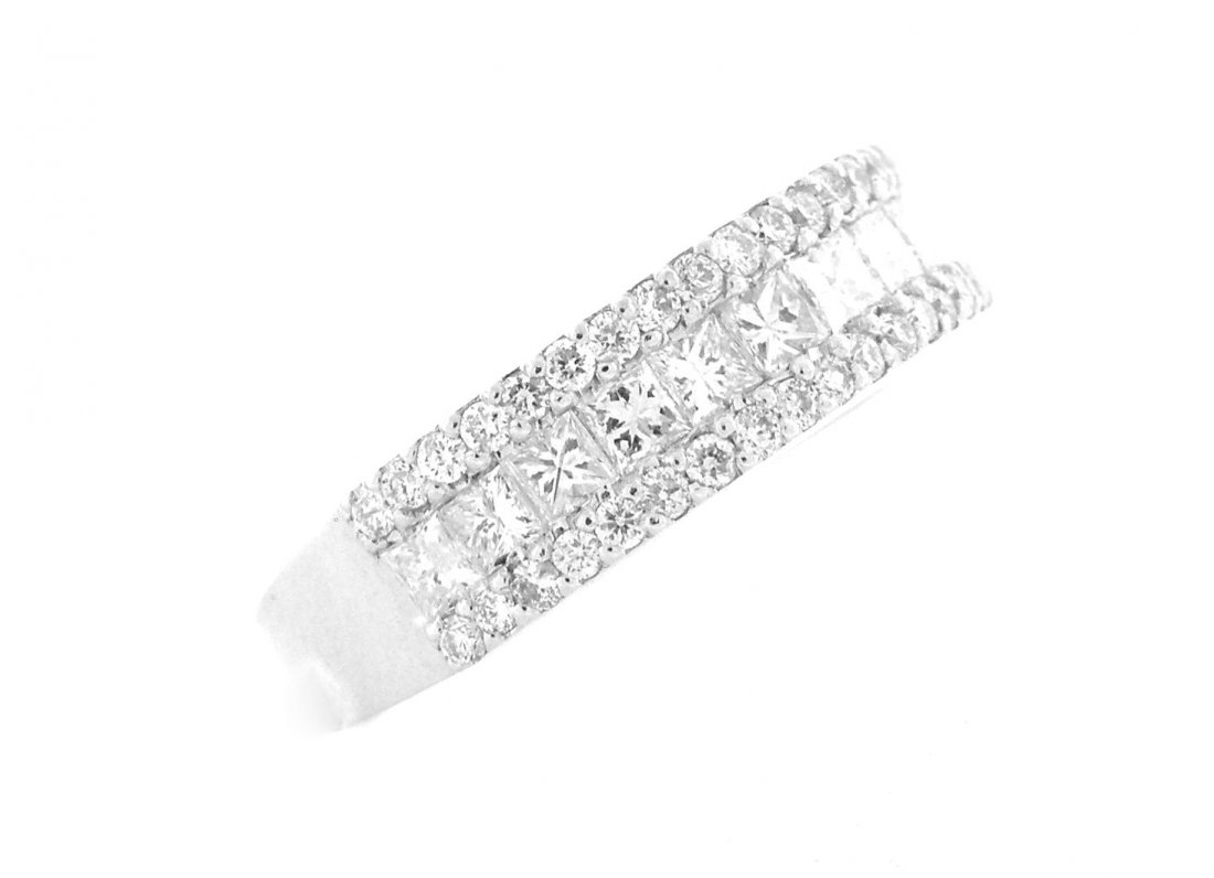 1.31ct 14K PRINCESS CUT DIAMOND ETERNITY WEDDING BAND: Diamond BandConditionNewMaterial14K White GoldStonesDiamond, Princess Cuts H SI1Stone Weight1.31ct twSize6.5Weight4.3g