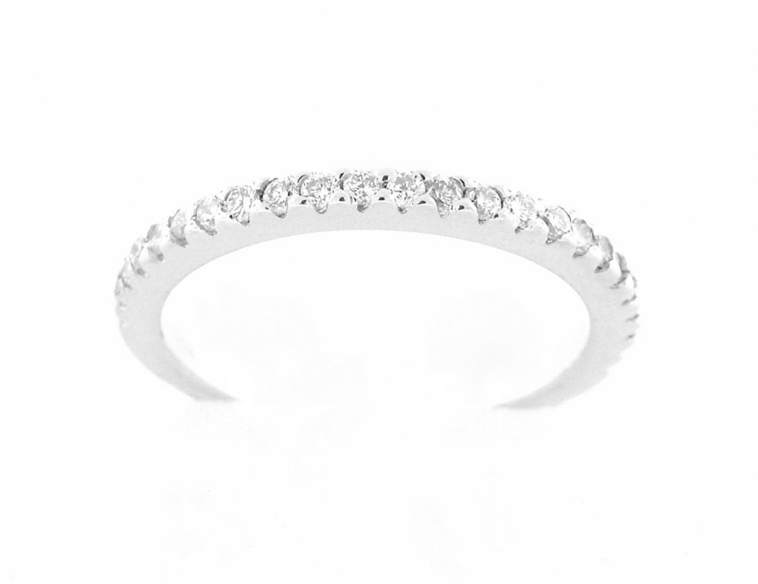 NEW 18K HALF ETERNITY DIAMOND WEDDING BAND RING: Diamond Half Eternity RingCondition NewMaterial 18k White GoldStones Diamonds G SI1Stone Weight 0.33ct tw apxSize 6.5 - 1.9mm WideWeight 2.1g