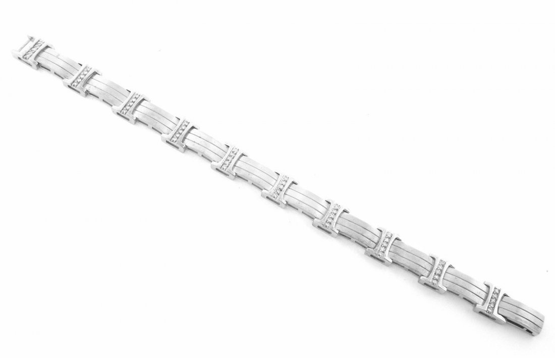 1ct 14K WHITE GOLD DIAMOND MEN'S BRACELET SOLID HEAVY: Men's BraceletCondition NewMaterial 14K White goldStones Diamonds G SI1Stone Weight 1ct twSize 8"Weight 33.3gComment Comes with presentation box, absolutely Stunning Bracelet, Matte & Shiny