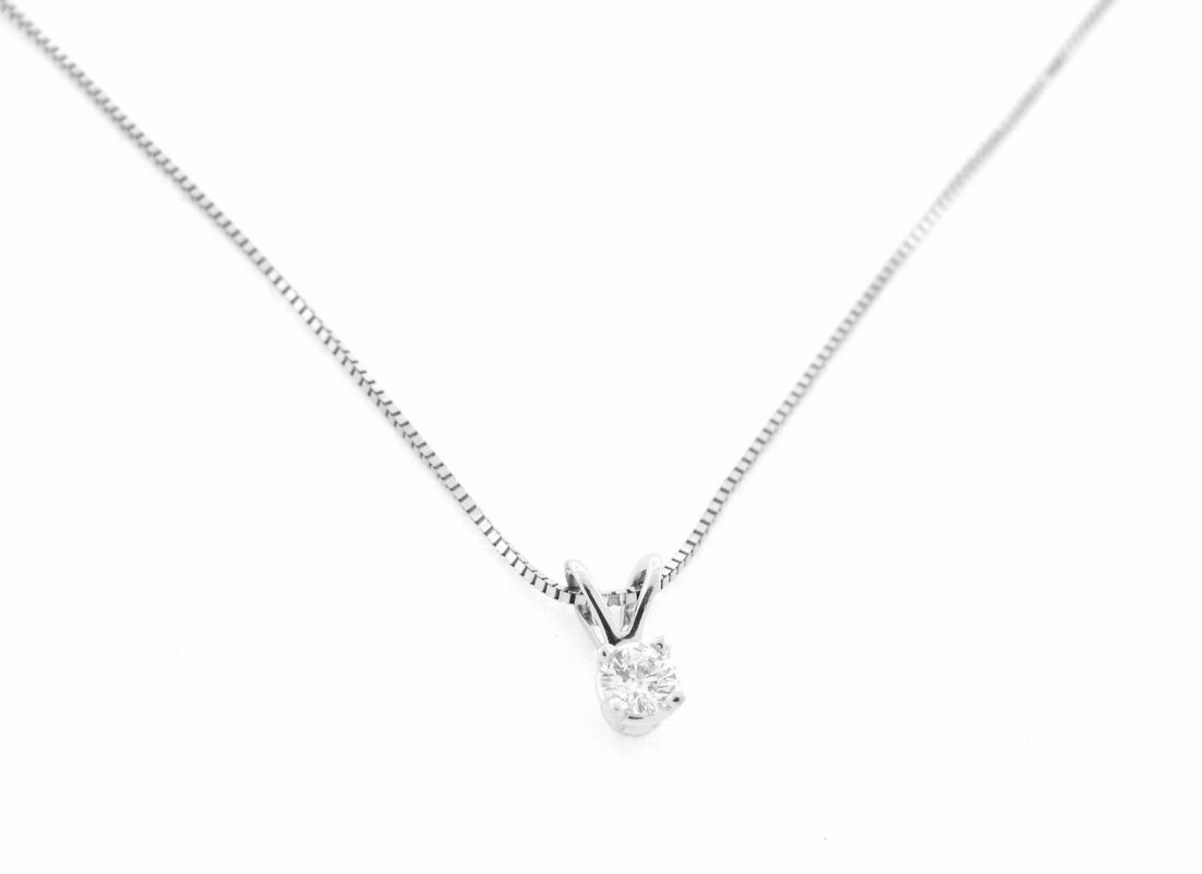 14K WHITE GOLD LADIES DIAMOND SOLITAIRE NECKLACE: Diamond Solitaire NecklaceConditionNewMaterial14k White goldStonesDiamond H SI1Stone Weight0.10ct twSize18"Weight1.3g