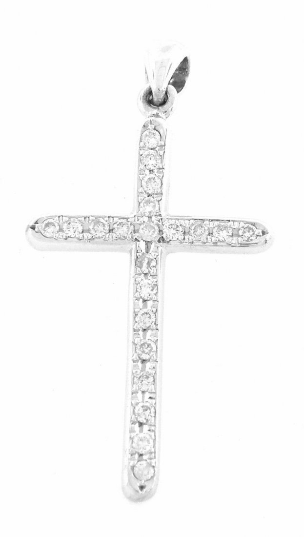 NEW 14K WHITE GOLD DIAMOND LARGE CROSS PENDANT 0.75ct: Cross PendantConditionNewMaterial14k White goldStonesDiamonds H SI1Stone Weight0.75ctSize1.75" H x 0.88" WWeight3.5g