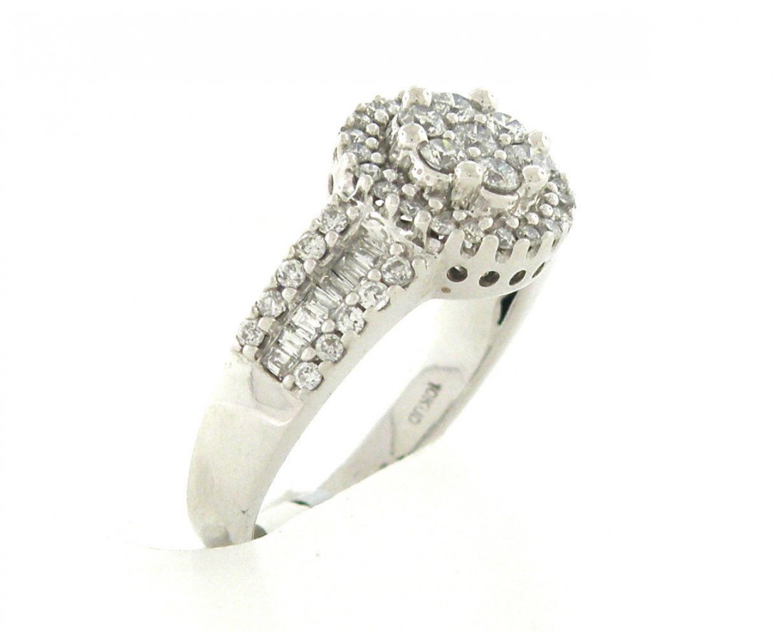 10K WHITE GOLD DIAMOND BAGUETTE & ROUND RING: Diamond RingConditionNewMaterial10K White goldStonesDiamonds, Baguette & Round cut H SI1Stone Weight1.25ct twSize6 (we can resize, please contact us first)Weight3.6g
