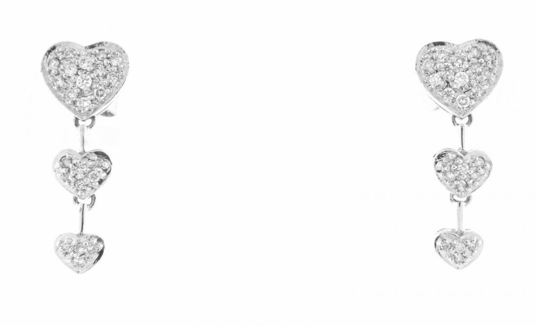 14K WHITE GOLD DIAMOND TRIPLE HEART DROP EARRINGS: Ladies EarringsConditionNewMaterial14k White goldStonesRound Diamonds H SI1Stone Weight0.50ct tw apxSize0.91" H x 0.35" WWeight3.6g