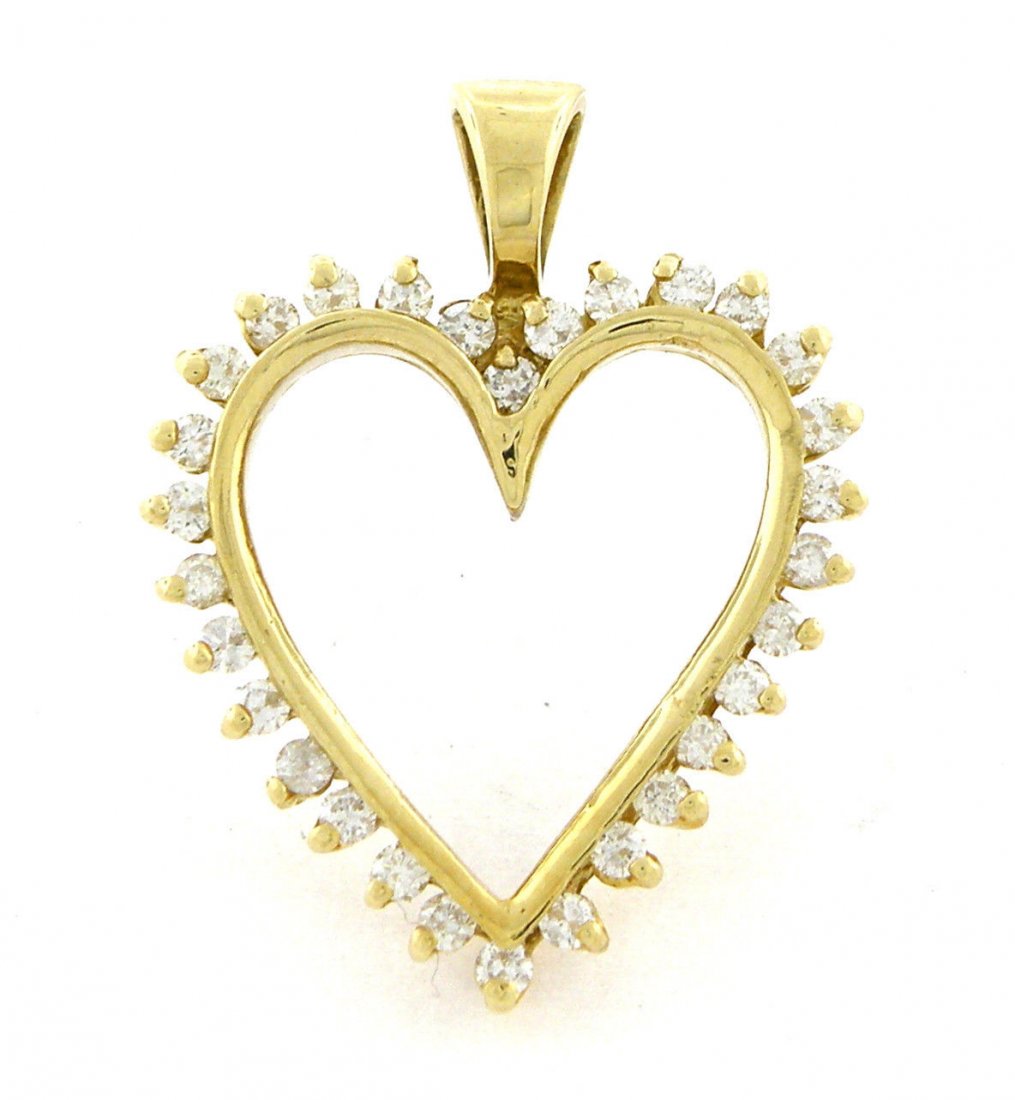 14K YELLOW GOLD LADIES DIAMOND OPEN HEART PENDANT: Diamond Heart PendantConditionNewMaterial14k Yellow goldStonesRound Diamonds I SIStone Weight0.63ct twSize1.24" x 0.95"Weight5.5g