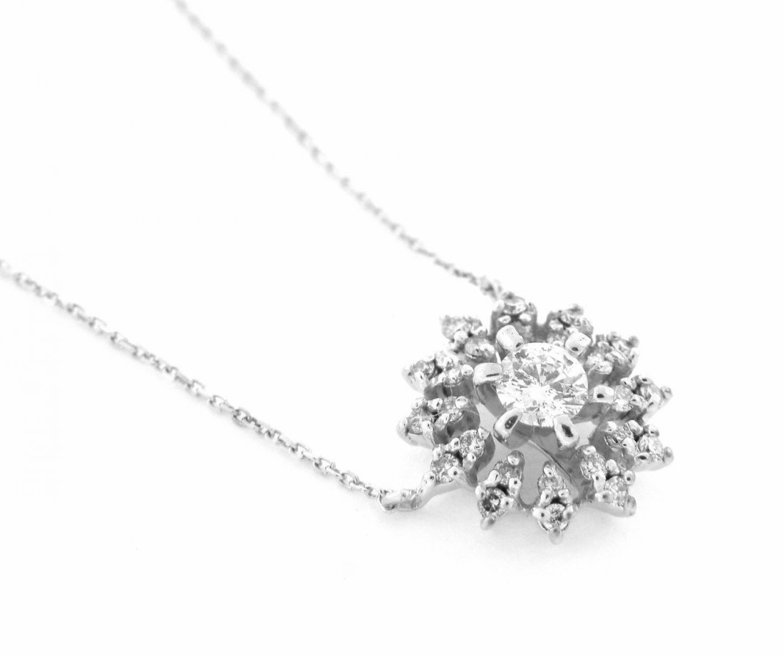 NEW 14K WHITE GOLD DIAMOND FLOWER NECKLACE: Star NecklaceConditionNewMaterial14K White goldStones Diamonds H SI1Stone Weight 0.50tcw Size 15" has extension for 16" Long Weight 2.4g