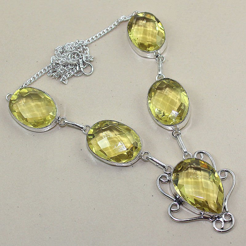 Lemon Topaz Silver Necklace: Measures 7-8" in length. Weighs 50 grams.