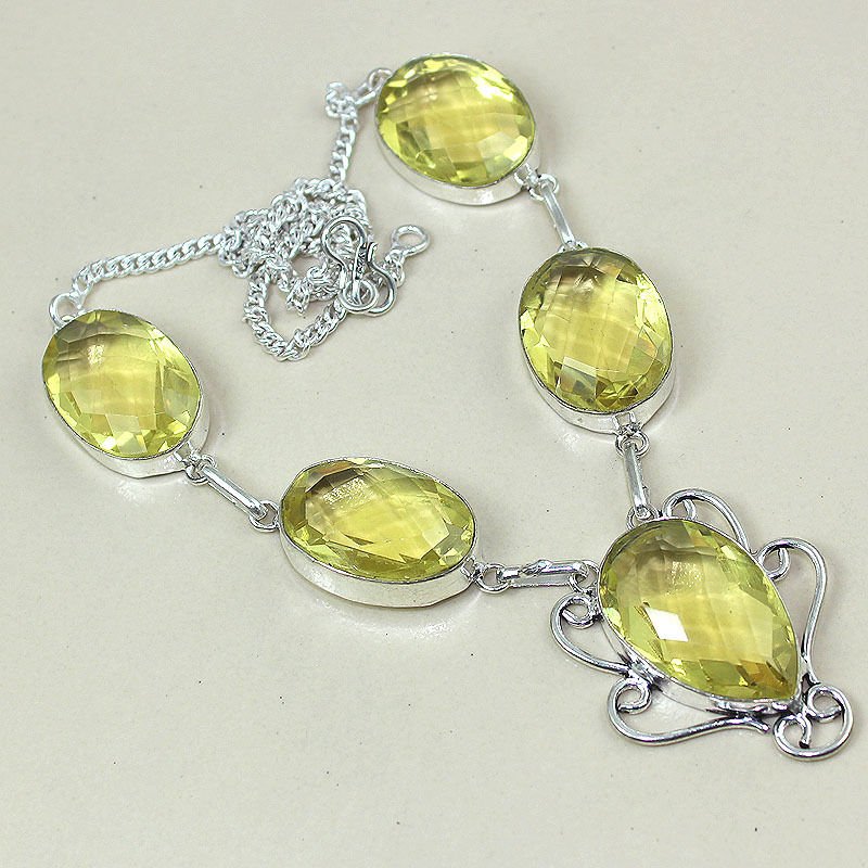 Lemon Topaz Silver Necklace: Measures 18" in length. Weighs 52 grams.