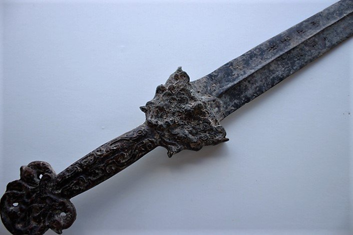 ancient text sword in ancient China shang dynasty: engraved with the ancient text sword in ancient China shang dynasty Period Circa 16th Century BC to 11th Century BC),Measures 79cm. From a private collection