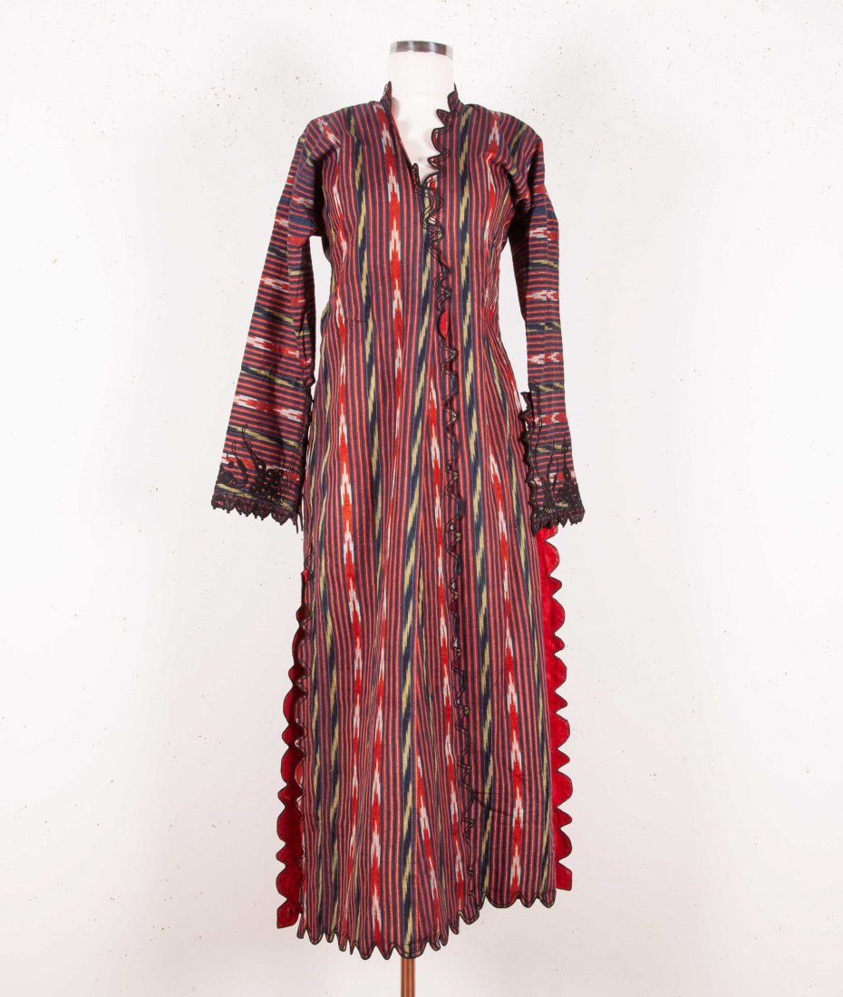 Middle Eastern Ikat Dress Late 19th-Early 20th C: This is a handmade ikat dress made in the Middle East. It was made in the late 19th-early 20th century. The dress was made in the Ottoman ucetek style. The piece is old and antique and therefore is no