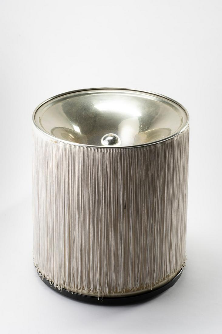 Gianfranco Frattini - "597" table lamp, 1961: H 40 cm x P 45 cm with silver reflector aluminum structure and rayon fringes Prod. Arteluce, Italy LITERATUREC. e D. Krzentowski, The complete designers’ lights II, C. e D. Krzentowski, 2014, p. 204