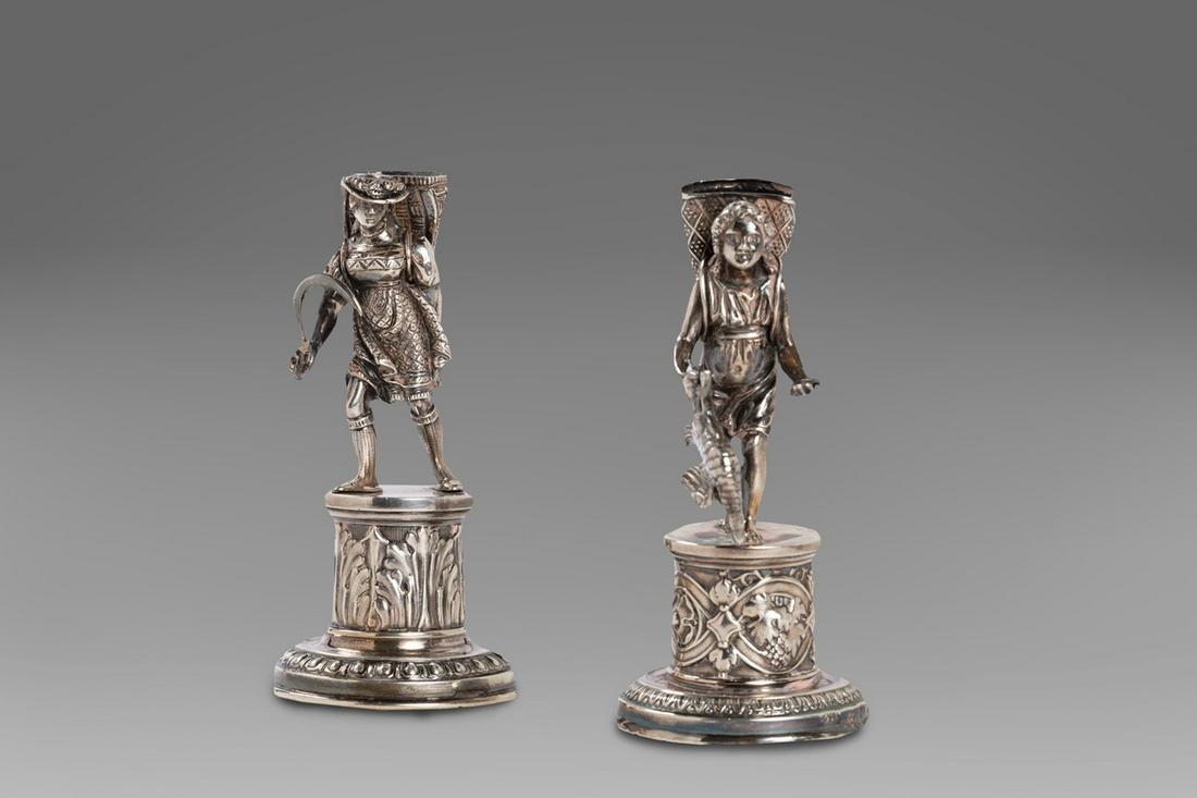 Two silver stick holders, Lombard - Veneto stamp, 19th: height 11 cm each