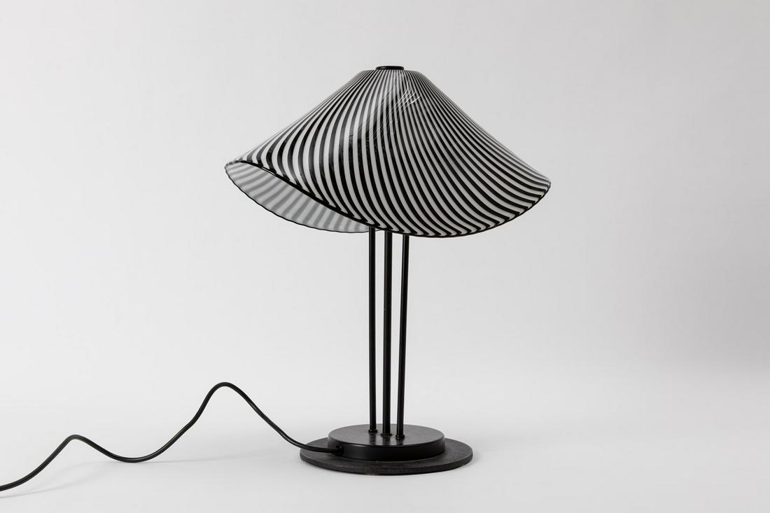 Lino Tagliapietra - Table lamp: in glass with black and white rods. Prod. Effetre International Murano, manufacturer's label. cm h 48, l 41, depth 25