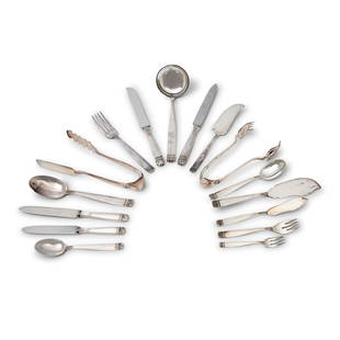 A silver cutlery set, Italy, 20th Century: consisting of 12 table spoons, 12 medium spoons, 12 dessert spoons, 12 coffee spoons, 12 ice cream spoons, 24 table forks, 12 medium forks, 12 fish forks, 12 dessert forks, 12 table knives, 12 medium