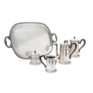 A tea and coffee silver service, Italy 20th Century: Five objects Weight kg 4,018 cm 35,00x61,00 h 20,00, 20,00, 10,00, 8,00