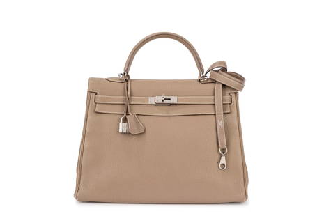 Hermès - Kelly Retourne 35 cm bag: Etoupe taurillon clemence leather Kelly Retourne 35 cm bag, palladium hardware, shoulder strap and Bastia coins purse, with dustbag (slight defects).