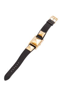 Hermès - Médor wristwatch: Médor black leather wristwatch, mm 23 x 33 (slight defects).