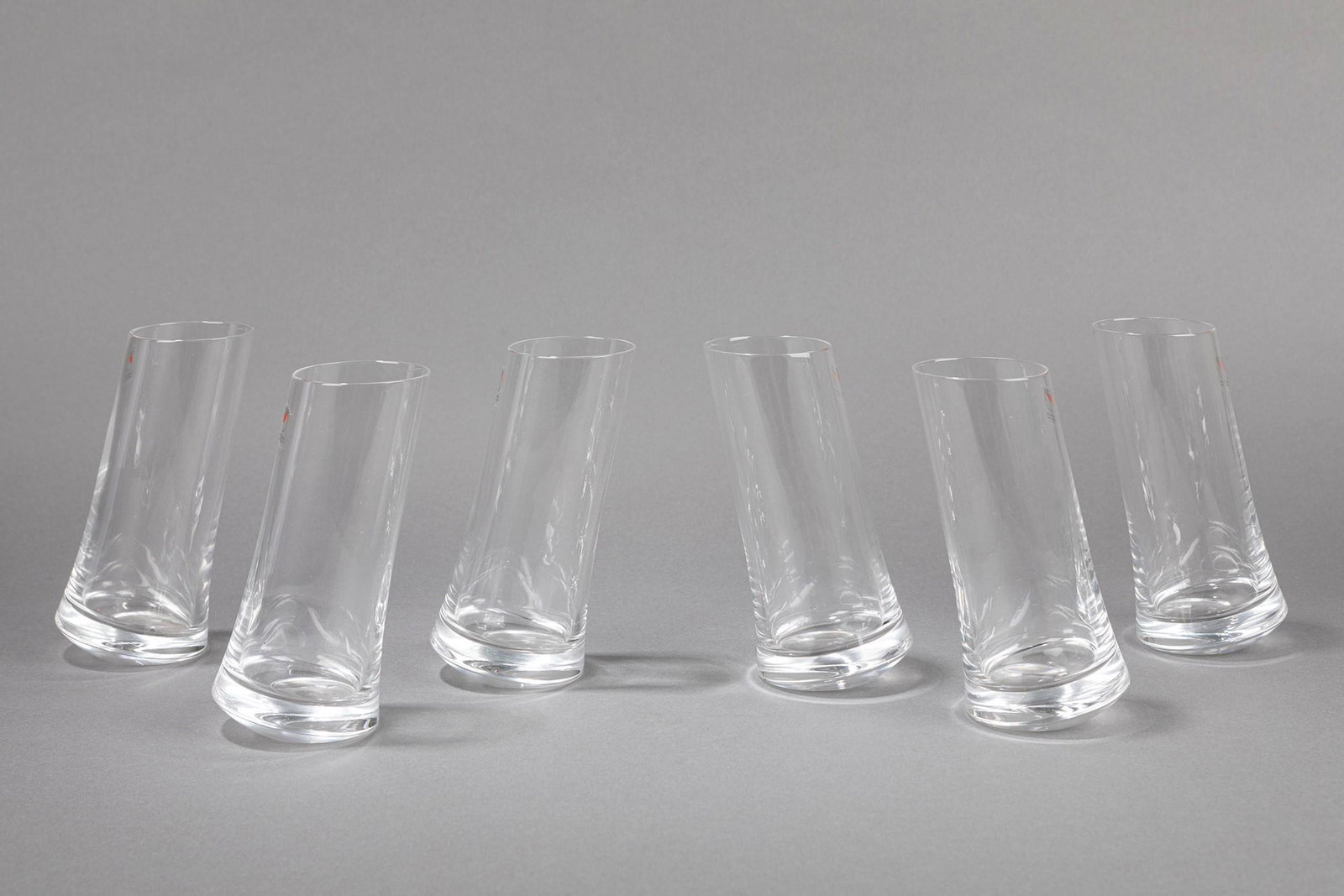 Angelo Mangiarotti - Set: Set, 1980 ca. h 16 x 6 cm composed by six transparent crystal glasses. Colle Manufacture. Original label.