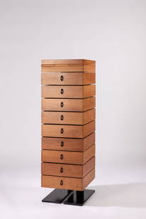 Mario Botta - Robot: Robot, 1989 h 121 x 36 x 38 cm Desk/chest of drawers. Iron base, pear wood, nine drawers and one element as writing desk. Alias Manufacture. LITERATUREOp to Pop: Furniture of the 1960 s, Boston