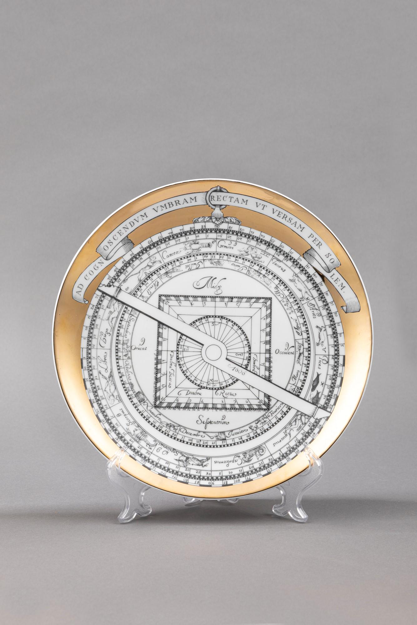 Piero Fornasetti - Astrolabio: Astrolabio, 1960 ca. diam 24 cm White pottery plate n.6. Silk-screen decoration. Marked under the base.