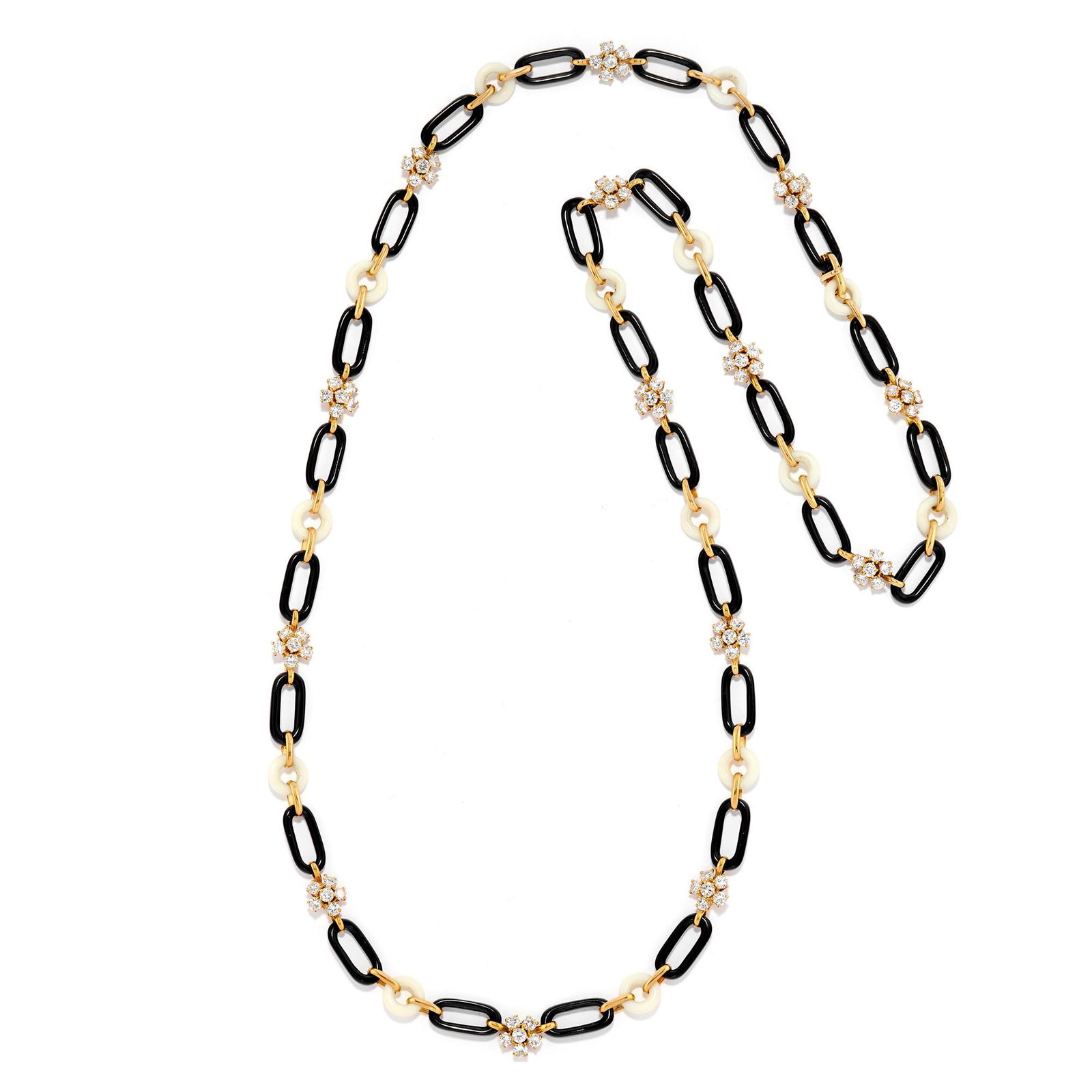 Van Cleef & Arpels - A 18k yellow gold, onyx, white coral and diamond necklace, Van Cleef & Arpels: Van Cleef & Arpels - A 18k yellow gold, onyx, white coral and diamond necklace, Van Cleef & Arpels White coral Onyx Brilliant cut diamonds approx. ct 9,00 Weight h 46,80 cm 83,00