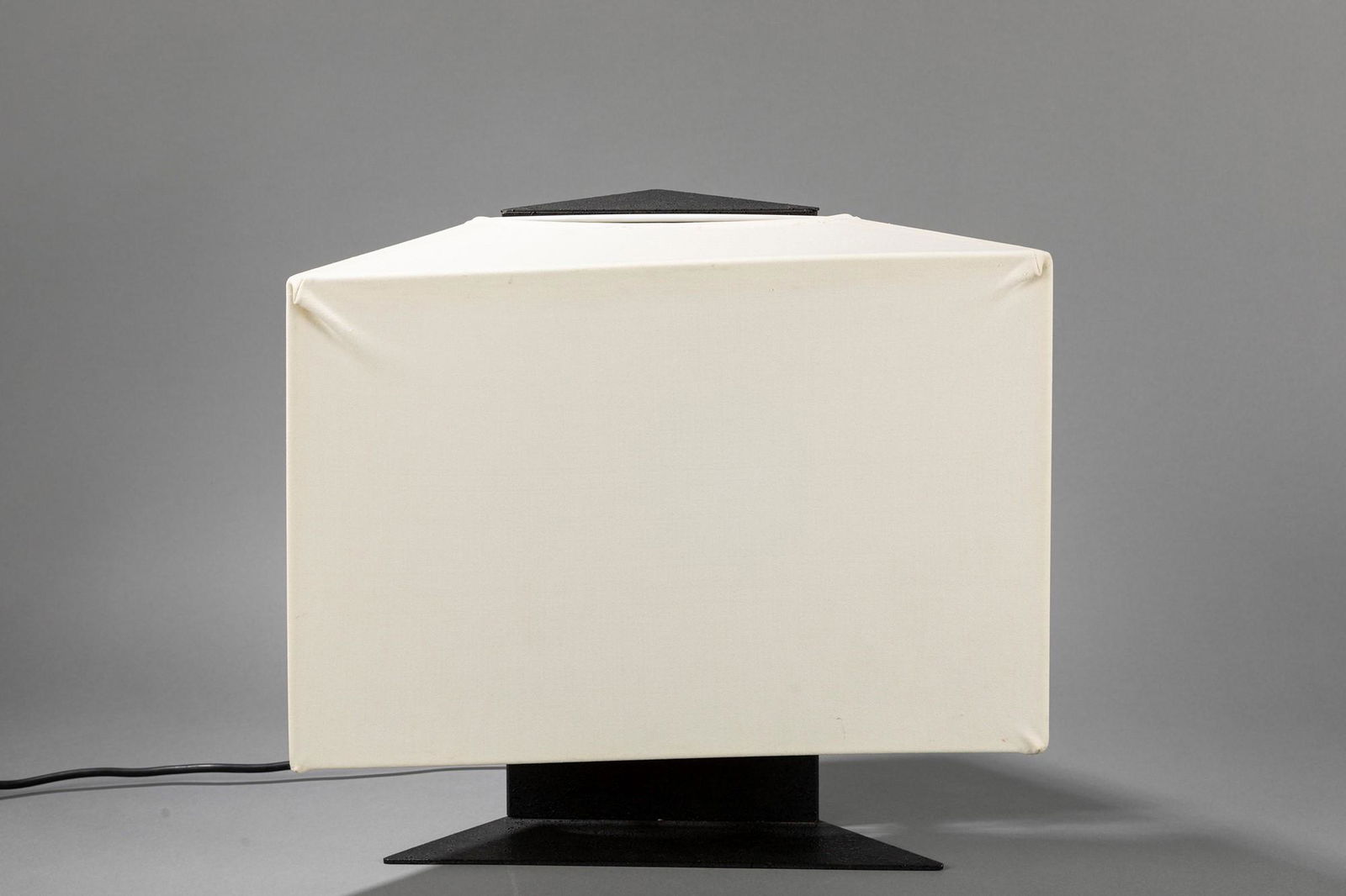 Cini Boeri - Table lamp, 1973: 40 x 46 cm model Accademia. Metal base and fabric diffuser. Artemide Manufacture. Original label. LITERATUREGiuliana Gramigna, Repertorio del Design Italiano1950-2000, Allemandi, 2011, pag. 257