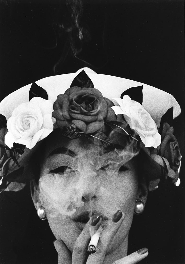 William Klein (1928-2022) - Hat + 5 Roses, Paris, 1956: Gelatin silver print, printed later cm 60,5 x 50,5 (cm 54,5 x 40 picture) | 23.8 x 19.8 in. (21.4 x 15.7 in. picture) Signed, titled and dated in pencil on the verso Framed LITERATURE Vogue, Paris, 19