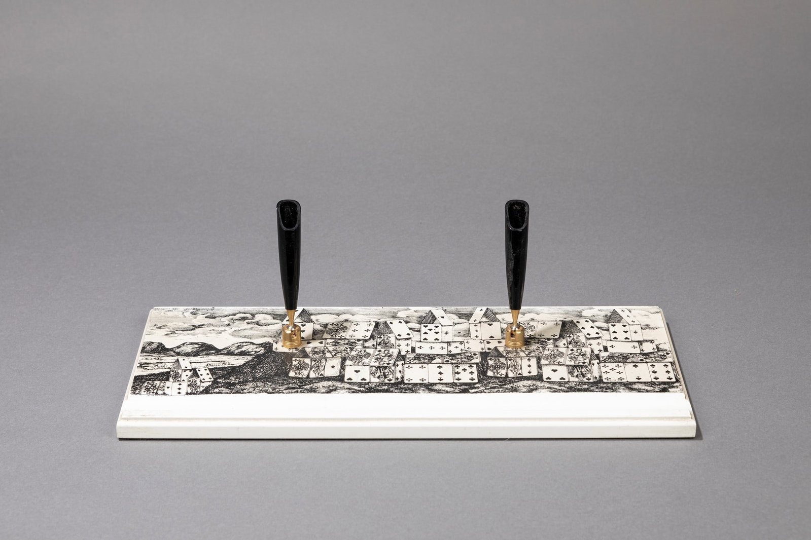Piero Fornasetti (1913-1988) - Pen holder, 1960 ca.: h max 11 x 13 x 21 cm Screen-printed wood. Original mark. Fornasetti Manufacture. T
