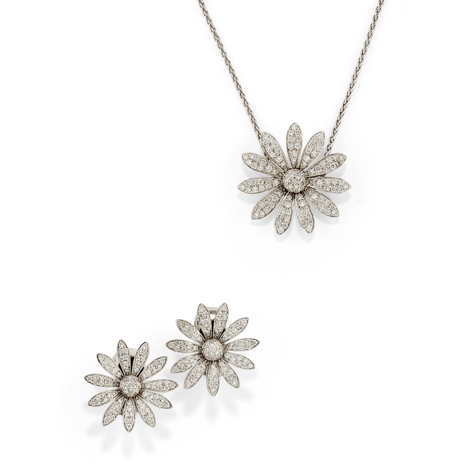 Crivelli - Diamond demi parure, 18k white gold: Diamond demi parure, 18k white gold, consisting of a pair of clip earrings and a pendant attached to a tubular link, designed in a floral motif, featuring brilliant cut diamonds totaling approximately