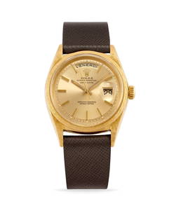 Rolex Day-Date 1806 Florentine ,60s: Rolex Day-Date 1806 Florentine, 60s 18k gold round case and bezel with Florentine finishing, n.1492776. Champagne dial, applied indexes. Automatic movement, cal.1556. Leather strap and Rolex gold