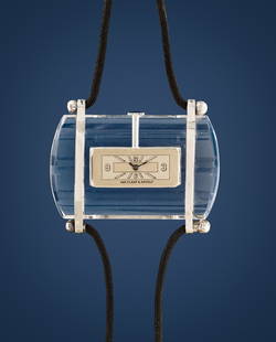 Van Cleef & Arpels rock crystal ,40s: Van Cleef & Arpels rock crystal, 40s Rock crystal rectangular case with platinum framework. Two-tone argenté dial, painted arabic numerals and indexes. Hand-winding movement. Rope strap. Size: 28