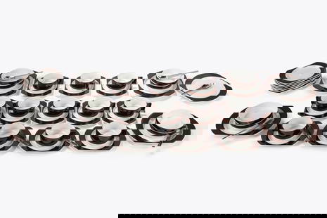 Joe Colombo - Ambrogio Pozzi (1930-1971) - Set Prima Classe Alitalia, 1970 ca.: different measures composed by twelve cups, nineteen saucers, five flat plates, eight small cups, eight spoons.Manufactured by Richard-Ginori ItalyScreen printed signatures on the baseSignatures embos