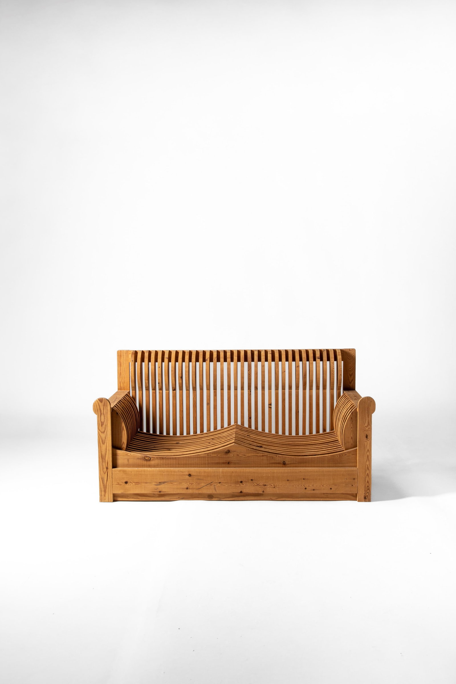 Mario Ceroli (Castel Frentano 1938) - Sofa from the 'Mobili nella Valle' series, 1972: 80 x 152,5 x 70 cm designed in 1972executed between 1975 and 1985russian pine woodsignature CEROLI / POLTRONOVA on the sidePoltronova edition, Agliana, Italy The lot is sold together with a certificat