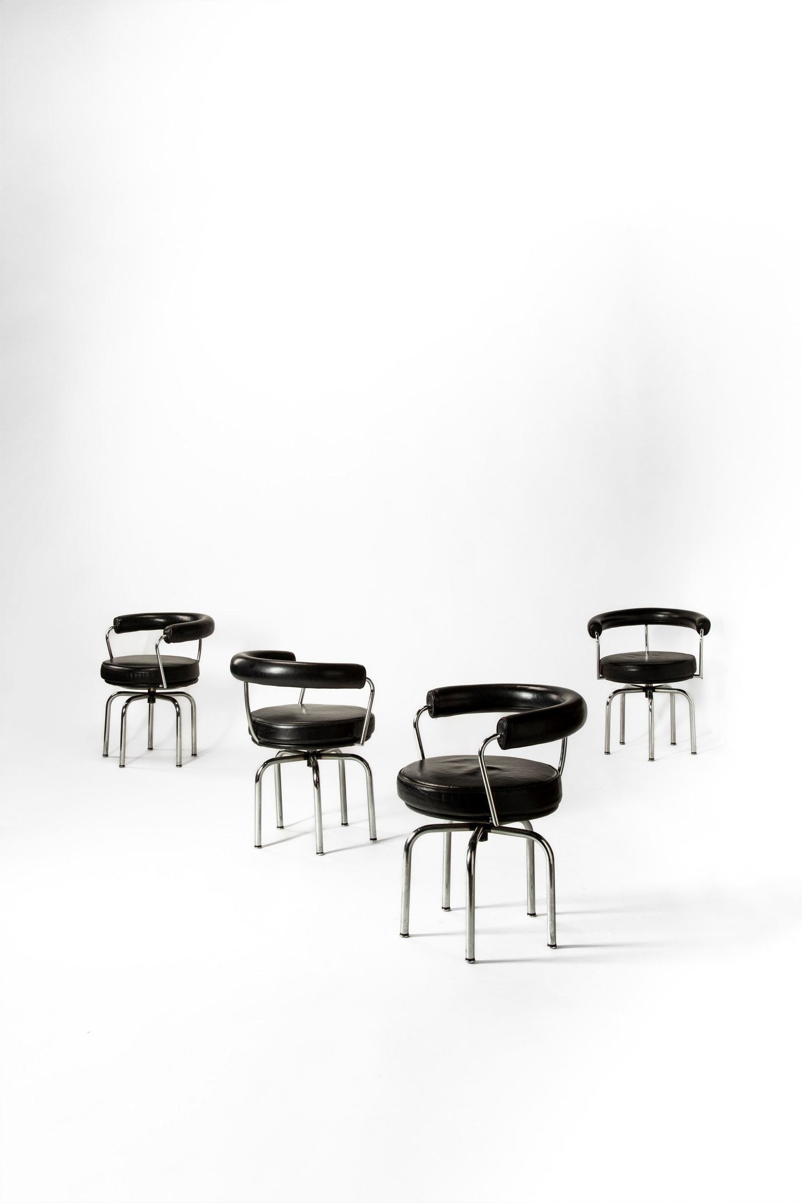 Charlotte Perriand - Set of four swivel chairs model no. LC7, 1927 (1 of 3)