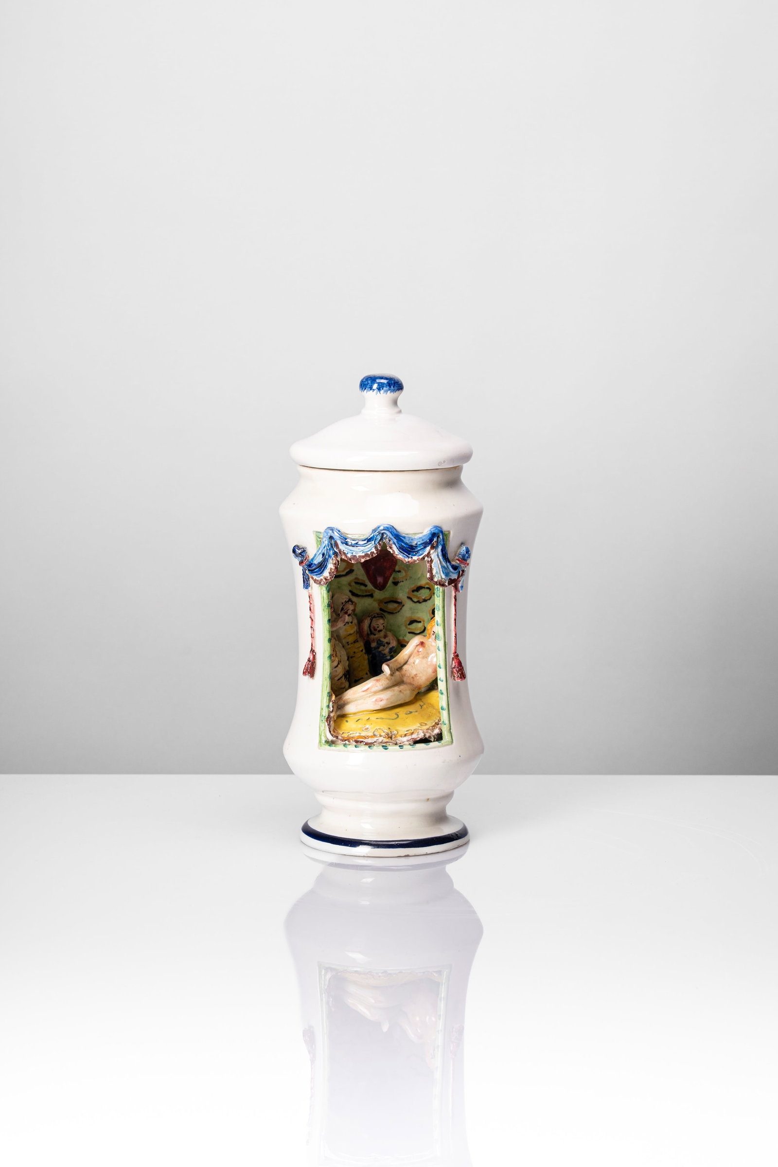 Andrea Parini (1906 - 1975) - Pharmacy jar 'Contre les languers de l'adolescence', 1950: 34 x 13 x 13 cm executed in 1950polychrome earthenwaresignature PARINI '50 on the insideinscription CONTRE LES LANGUERS DE L'ADOLESCENCE on the backAndrea Parini edition, Italy PROVENANCE Alberto