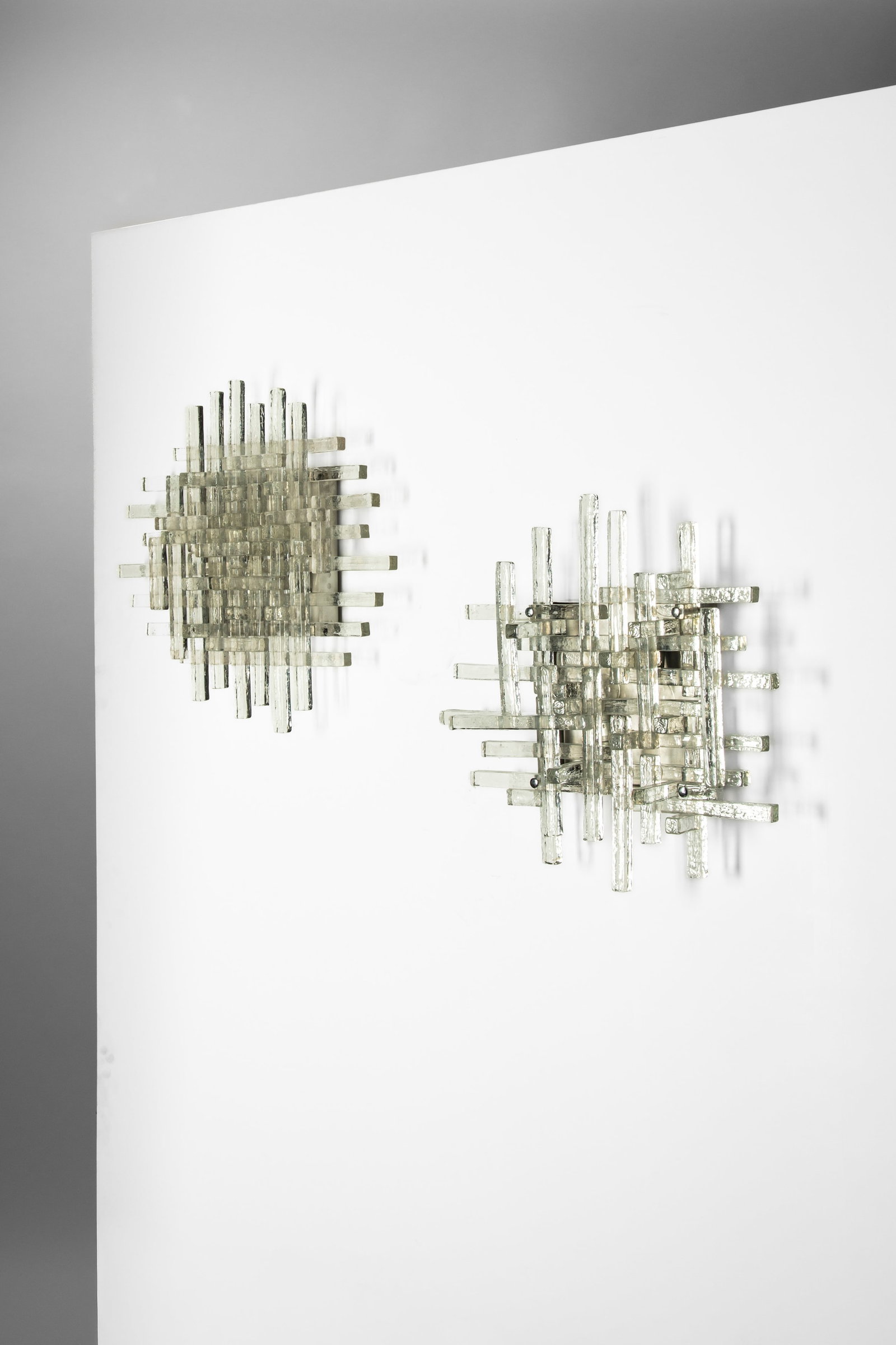 Poliarte - Pair of wall or ceiling lamps , 1960 circa: 52 x 56 cm 1960 circasolid glass, metalPoliarte edition, Italy PROVENANCE Private collection, Rome, Italy Finarte does not guarantee electrical components and suggests having all wiring inspected by