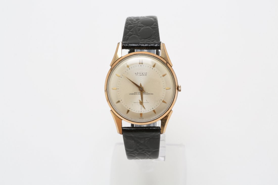 1970s Stainless Steel and Gold Unique Louvic: Louvic was a Swiss watch brand that manufactured watch models that looked similar to those of LeCoultre and Hamilton at a more friendly price. The 37 diamond Galaxy Mystery dial watch earns high value