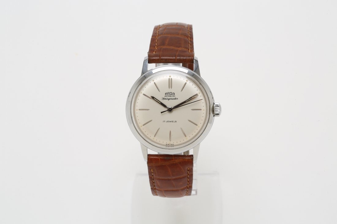1970s Stainless Steel Arsa Springmaster: Arsa is known for their broad spectrum of design styles, both asthetically and mechanically. This German company is known for their special line of watches for the blind. Year: 1970s Metal: Stainless 