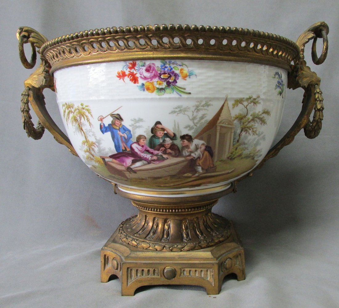 19thC KPM Hand Painted Centerpiece Bowl with Bronze: Antique, Circa late 1800's, KPM bronze mounted Centerpiece or Bowl. The bowl has hand painted decorations which include a scene of a group of gentleman dining and a group of men gambling. The mounts a