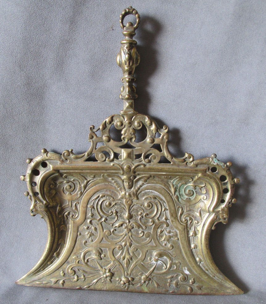 Victorian Gothic Crumb Tray Dust Pan w/Angel Gargoyles: An antique Victorian Gothic Crumb Tray or Dust Pan. The Crumb Tray is made of brass and is decorated with a Gothic motif that includes Gargoyles, an Angel and Strap work. overall dimensions are 10 1/2
