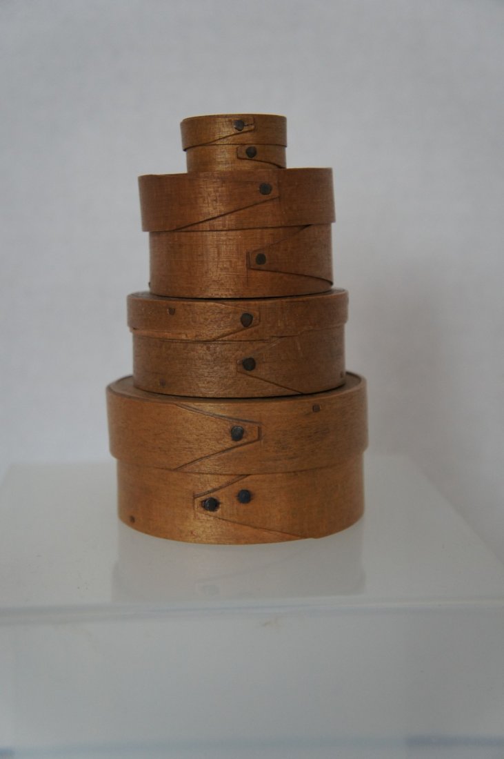 Stack of 4 tiny round opposing finger antique pantry (1 of 5)