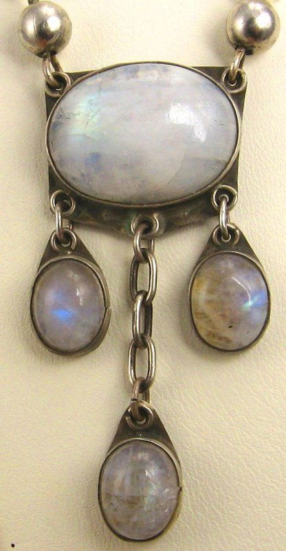 Labradorite Cab and Bead Necklace – Arts & Crafts: This necklace features a central (tested) silver panel with a big labradorite cab, ¾” x 9/16”. The whole panel with dangles measures 13/16” x 1-7/8”. The dangles are set 3 labradorite cabs on